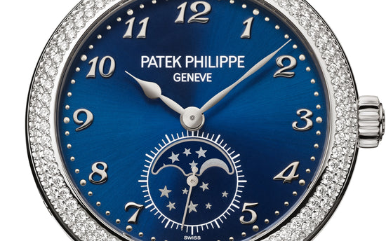Patek Philippe Replica Watch Complication Moon Phases, 18k White Gold with 132 (~1.09 cts.) brilliant-cut diamonds, 33mm, 7121/200G-001